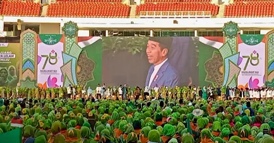 Presiden Joko Widodo saat menghadiri acara Harlah ke-78 Muslimat NU di Stadion Utama Gelora Bung Karno