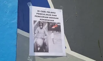 Poster penculik anak SMPN di Jalan Inspeksi Kali Grogol, Palmerah