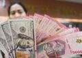 Rupiah pada Jumat pagi menguat jadi Rp16.612 per dolar AS 27 Rupiah pada Jumat pagi menguat jadi Rp16.612 per dolar AS